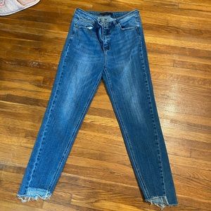 Risen denim skinny jeans
